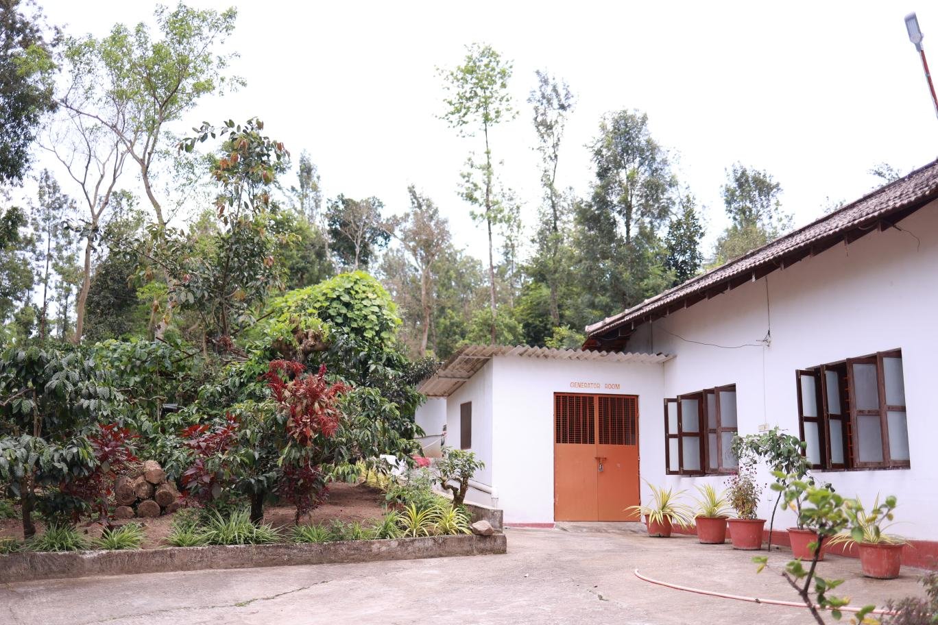 Estate grounds and accommodation at Ananda Vana Coorg Estate Stay