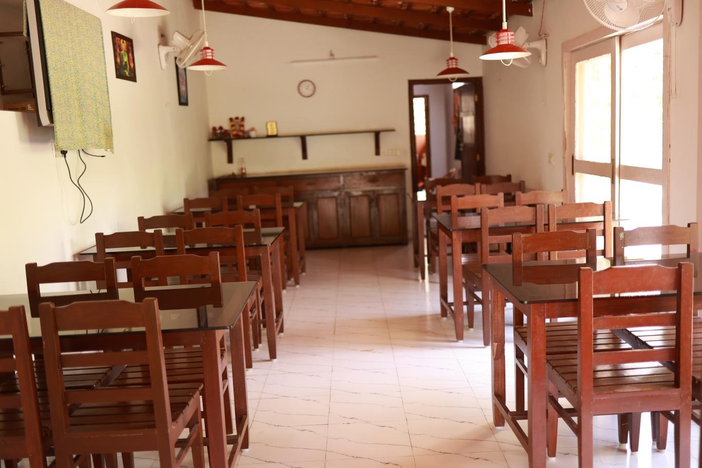 Spacious dining room at Ananda Vana Coorg Estate Stay