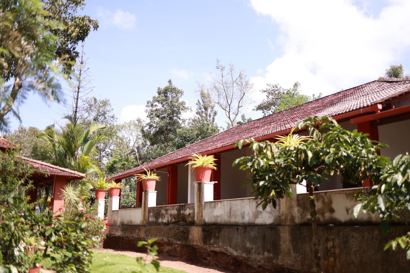 Exterior corridor at Ananda Vana Coorg Estate Stay
