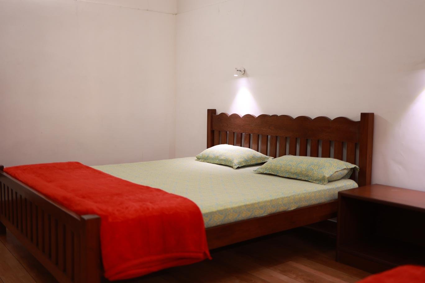 Family guest room at Ananda Vana Coorg Estate Stay