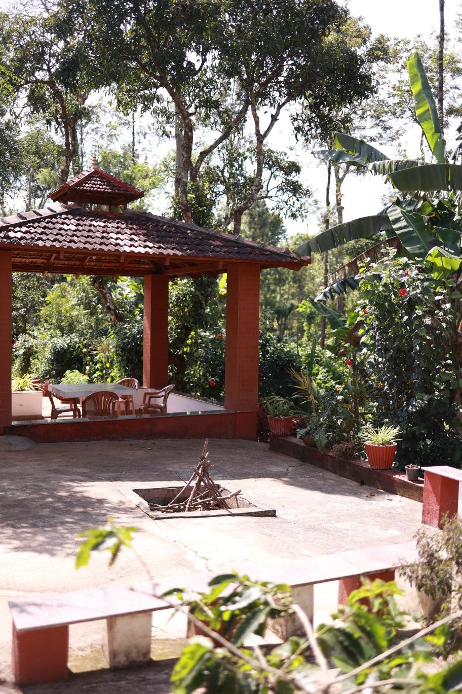 Campfire area at Ananda Vana Coorg Estate Stay